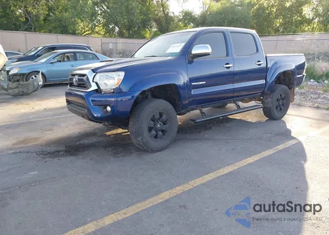 2015 Toyota Tacoma Base V6 z USA, uszkodzony, nr VIN 3TMLU4EN8FM190634